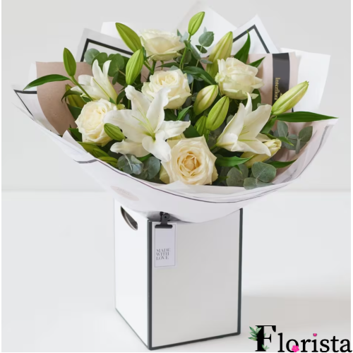 Beautiful bouquet of white roses and lilies