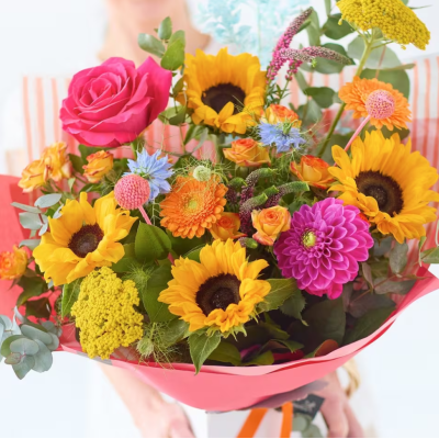 Luxurious summer trendy bouquet with sunflowers.